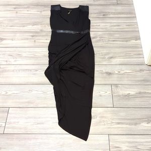 Black asymmetrical dress with leather detail. Size 0.